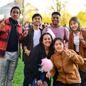 St. john's student socializing during a spring event on campus