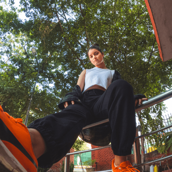 Female Social Media Shoe Influencer embracing shoe culture in shoe promotional content 