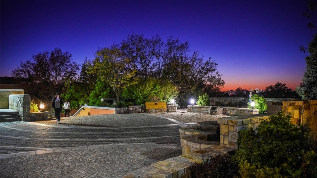 View of Residence Village landing at night on Queens campus